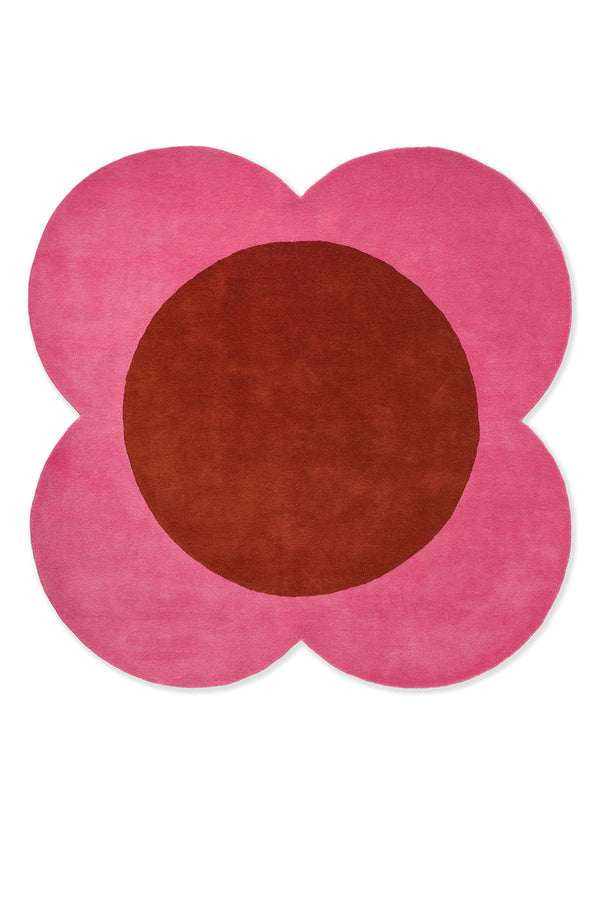 The red and pink round spot flower floor rug by Orla Kiely seen from above