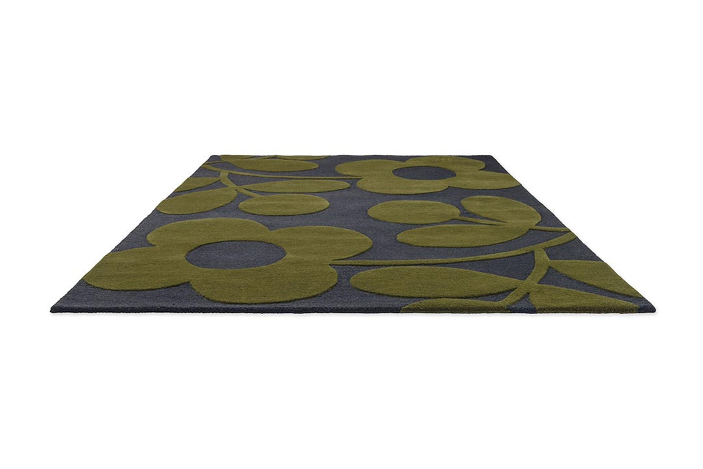 The Orla Kiely Sprig Stem floor rug in colour 'Marine' seen in perspective
