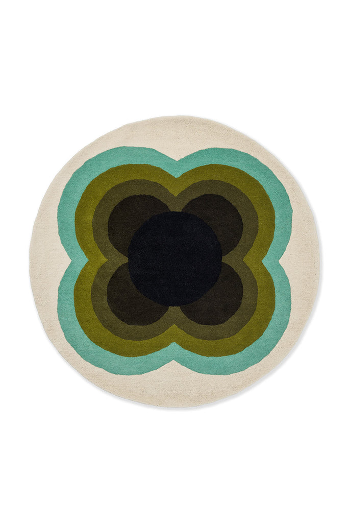 The Orla Kiely round, wool Sunflower rug in olive green tones, full view seen from above