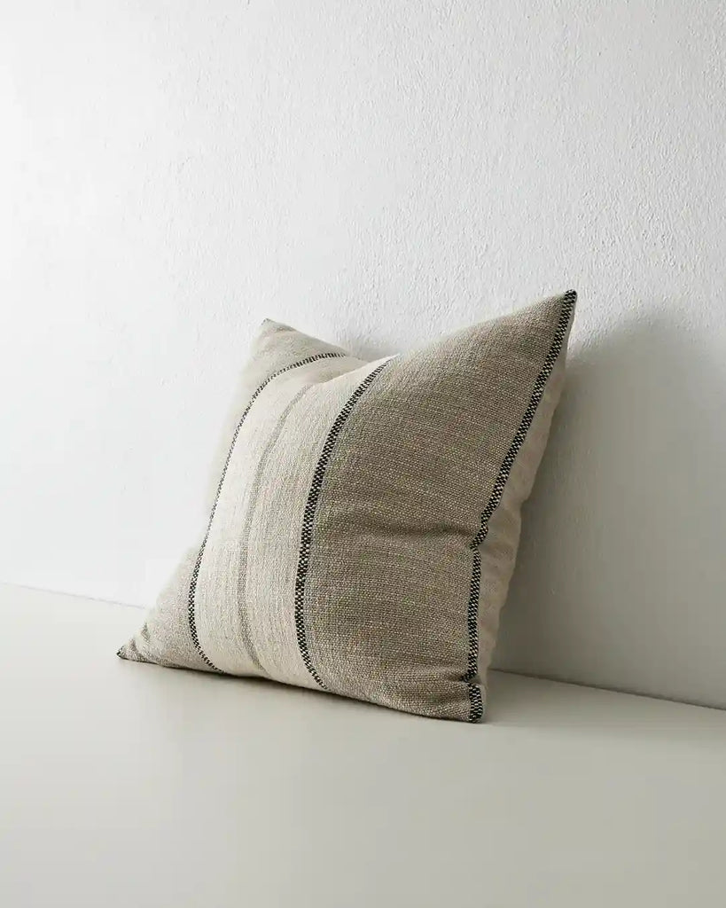 The Ottavio linen stripe cushion by Weave Home, seen from the side