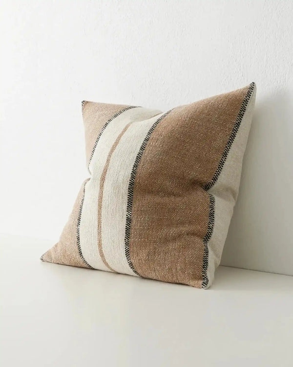 The brown, cream and black striped 'Ottavio' cushion by Weave Home nz