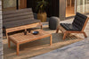 Braided outdoor rug by Globe West and Soren Liv, seen in a stylish outdoor setting with furniture