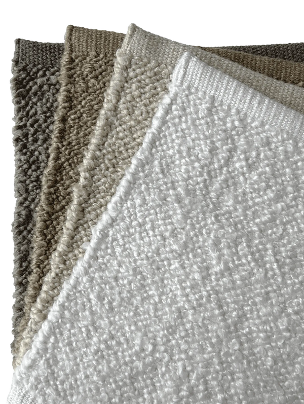 Close up of the Tribe Home Finn outdoor rugs in four colours