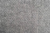 Close up of the Ruanui Station clooier's Coal chevron throw blanket in pure nz lambswool