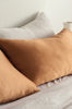 Close up of beautiful silk pillowcases on a bed, colour clay brown, by Bianca Lorenne