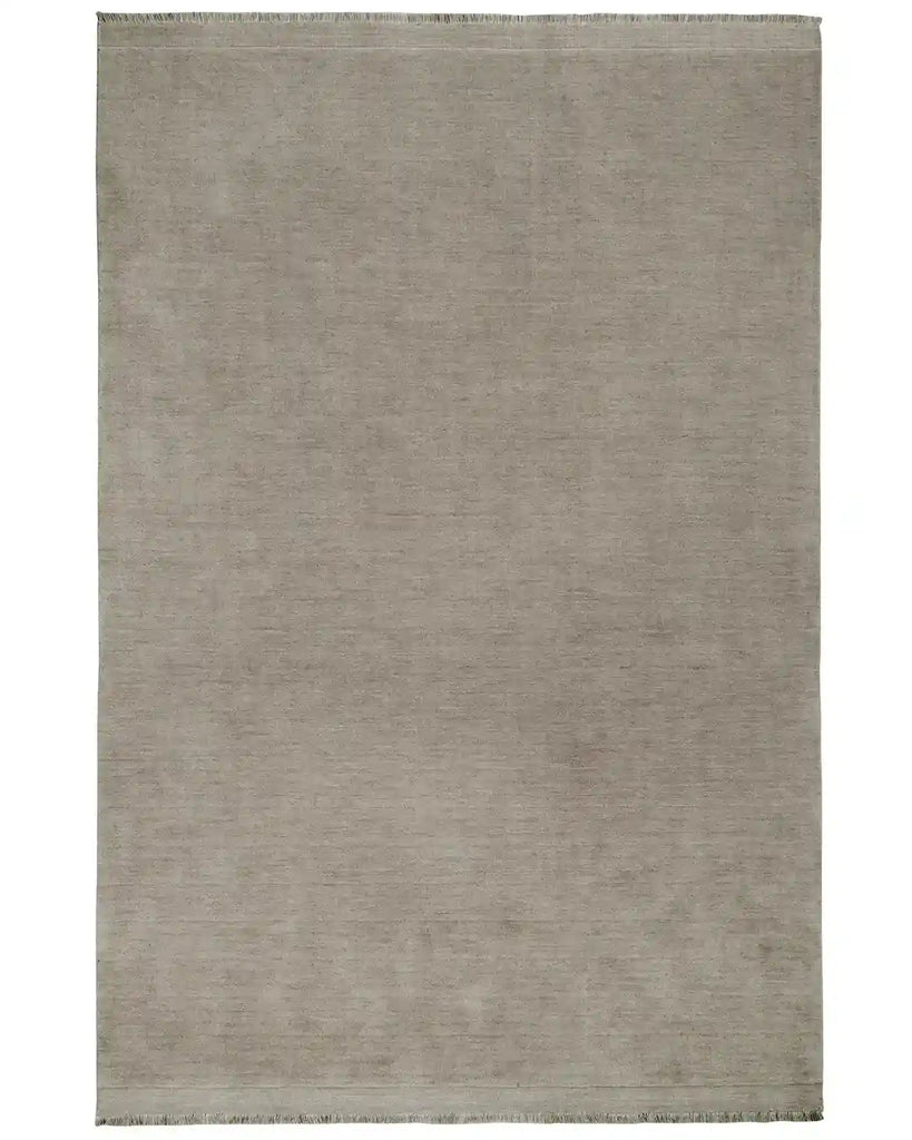 The Silvio wool floor rug, by Weave Home, in grey colour called 'Flint', seen from above