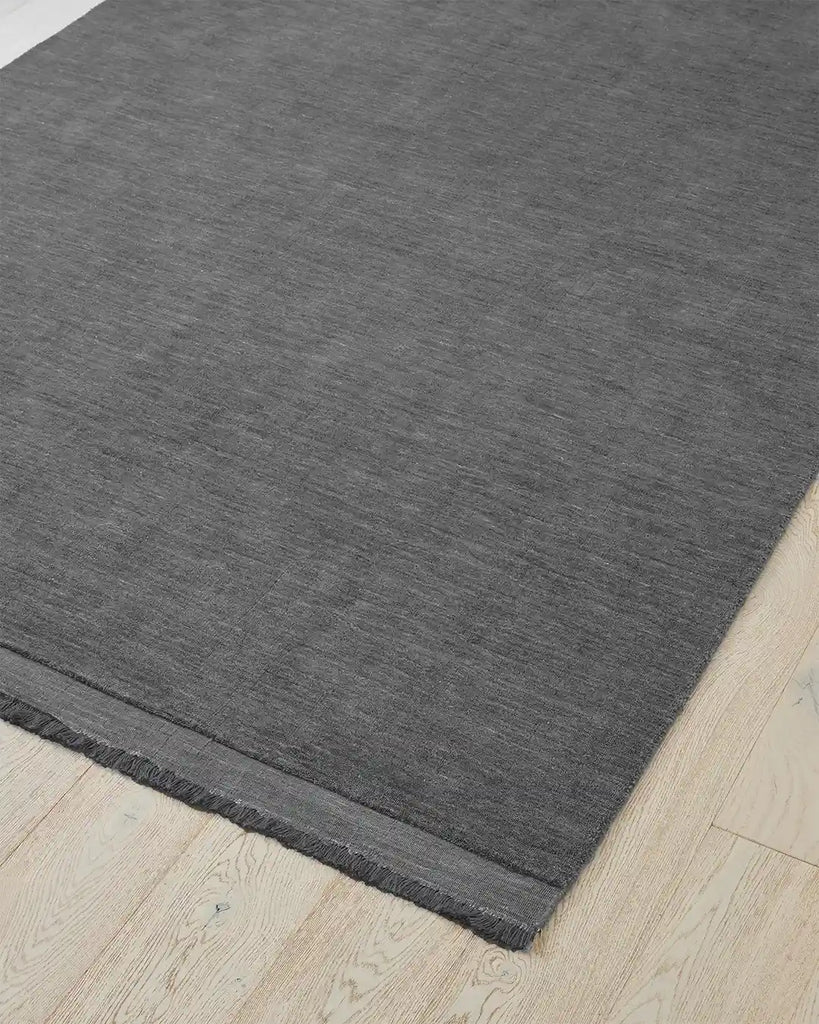 Grey Floor rug with a hint of blue, the Silvio wool rug by Weave nz