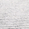 Close up of the weave of a charcoal and white patterned floor rug by Globe West and Soren Liv NZ
