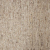 Close up of the weave of a textural woolen rug, in shades of cream, honey brown and light beige, with subtle colour shifts by Soren Liv NZ and Globe West. 
