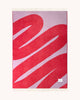 Full view of the Swirl patterned throw in shade Scarlet Lilac, the backside with a reversed pattern by Maison Deux
