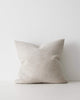 A cool toned off-white cushion with a soft subtle texture in the weave. 