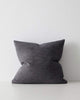 A soft textural cushion in muted midnight blue grey. 