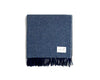 NZ wool throw blanket in blue nad white stripe, by Ruanui Station, seen folded with fringe detail