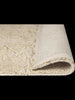 The Tribe Home Manhattan NZ wool floor rug, shown with the edge folded up to reveal the underneath