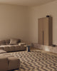 Tribe Home Chet wool and jute rug in a living room with a low modular sofa