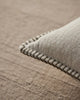 Close up of the brown stitch detail of the beige Alba neutral cushion by Weave