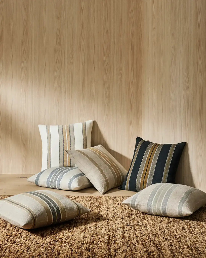 Striped linen Franco cushions by Weave Home seen in a sunny, warm home