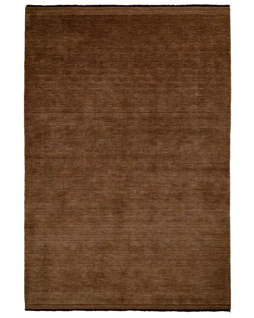 The Weave Home Silvio wool rug in colour Sienna - a reddish-brown