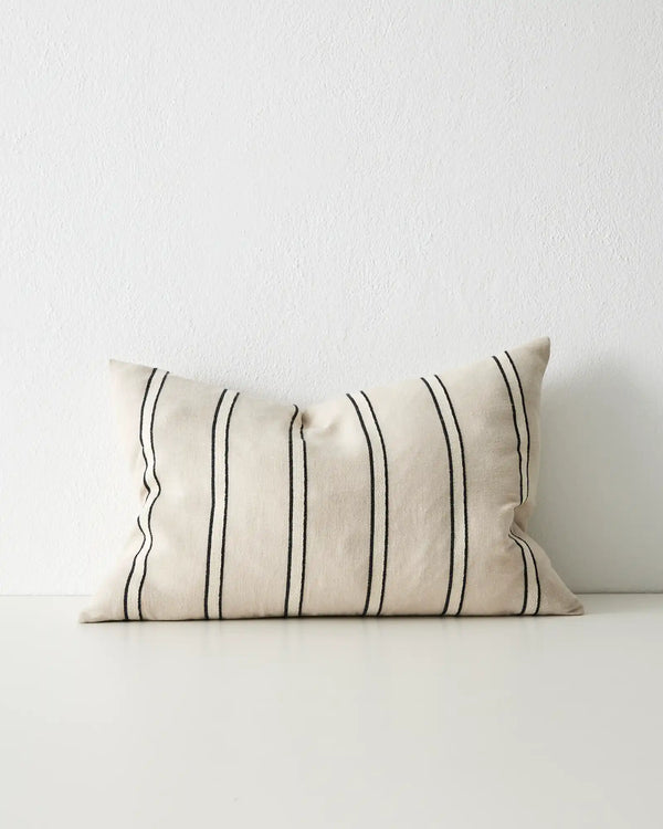 A classsic black, white and beige striped cushion. This is the lumbar style seen from the front