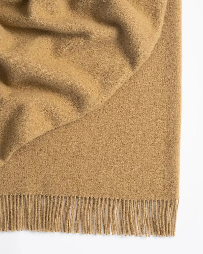 Weave Home wool throw blanket in colour 'camel' - a light brown