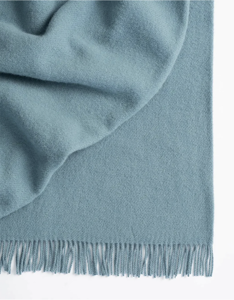 Weave Home wool throw blanket in colour 'cloud' - a light muted blue