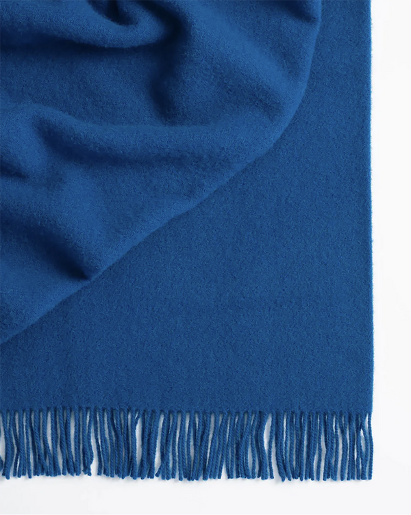 Weave Home wool throw blanket in colour 'petrol' - a beautiful mid blue