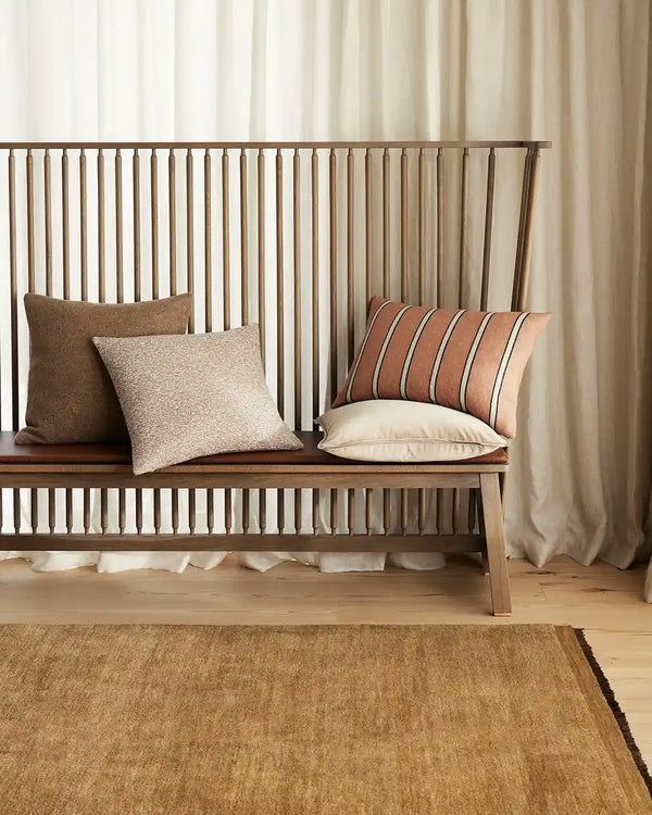 Stylish, modern cushions in warm brown tones and the Francesca neutral cushion by Weave Home
