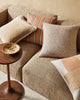 Warm-toned cushion combos by Weave Home nz, on a brown couch