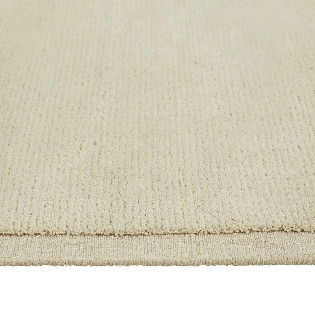 Close up of the contrast woven frame detail in the 100% wool Bower Frame floor rug