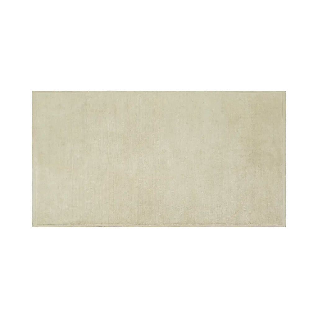 Full view of the Bower Frame floor rug, in shade Cloud, a soft natural ercu