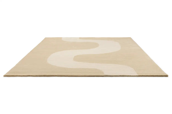 Perspective view of the Marimekko Seireeni wool floor rug in a neutral warm beige colour