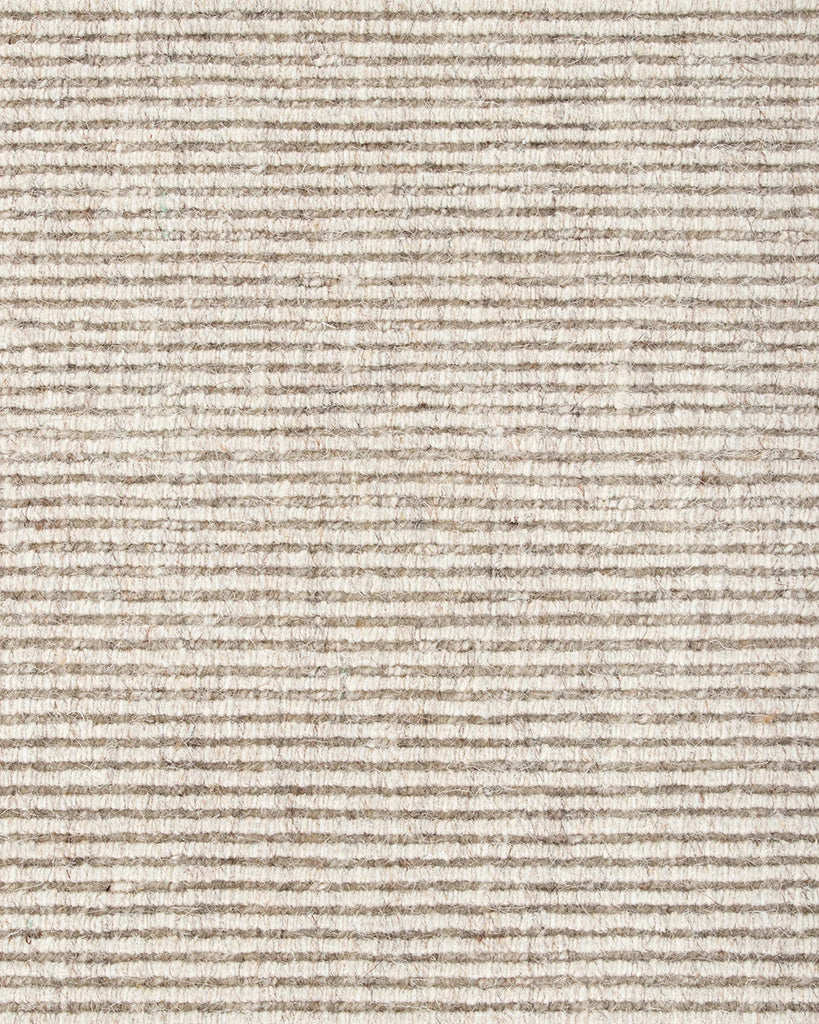 Close up of the Baya wool rug 'Vermont' in colour 'Sand showing the textural weave