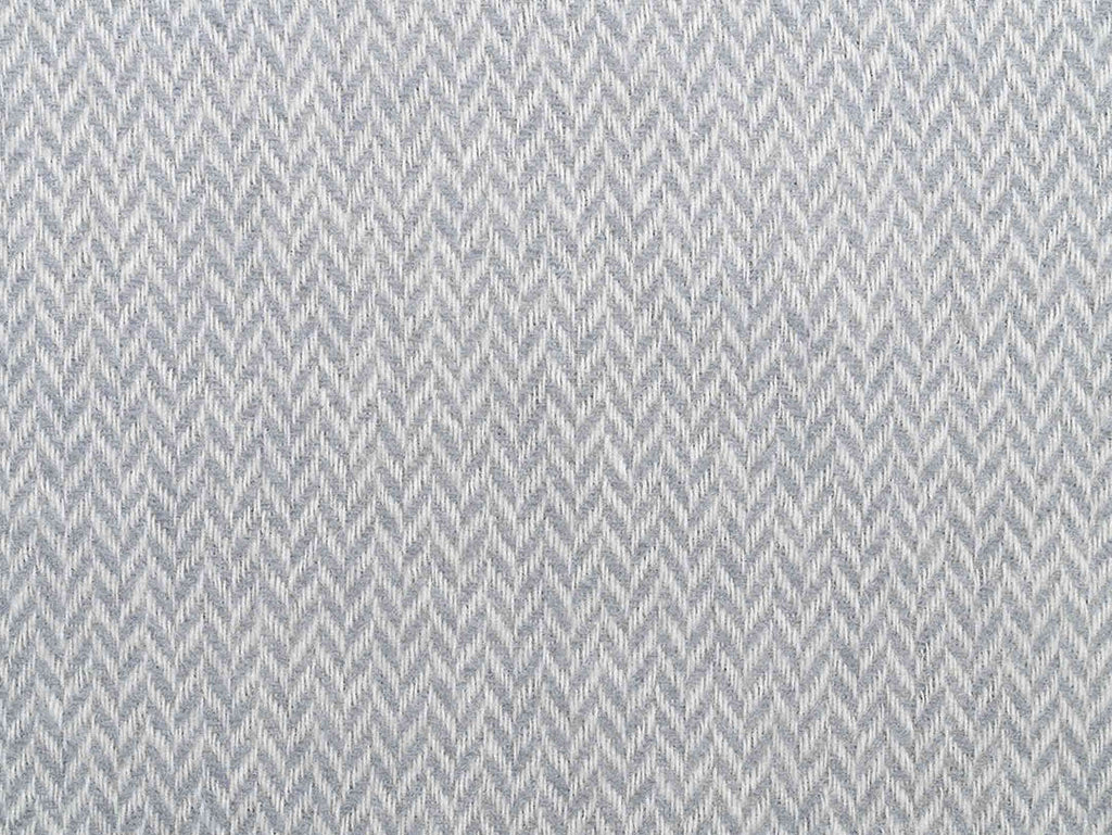Close up view of the chevron pattern on the Ruanui Station 100% wool throw in Gulley Grey