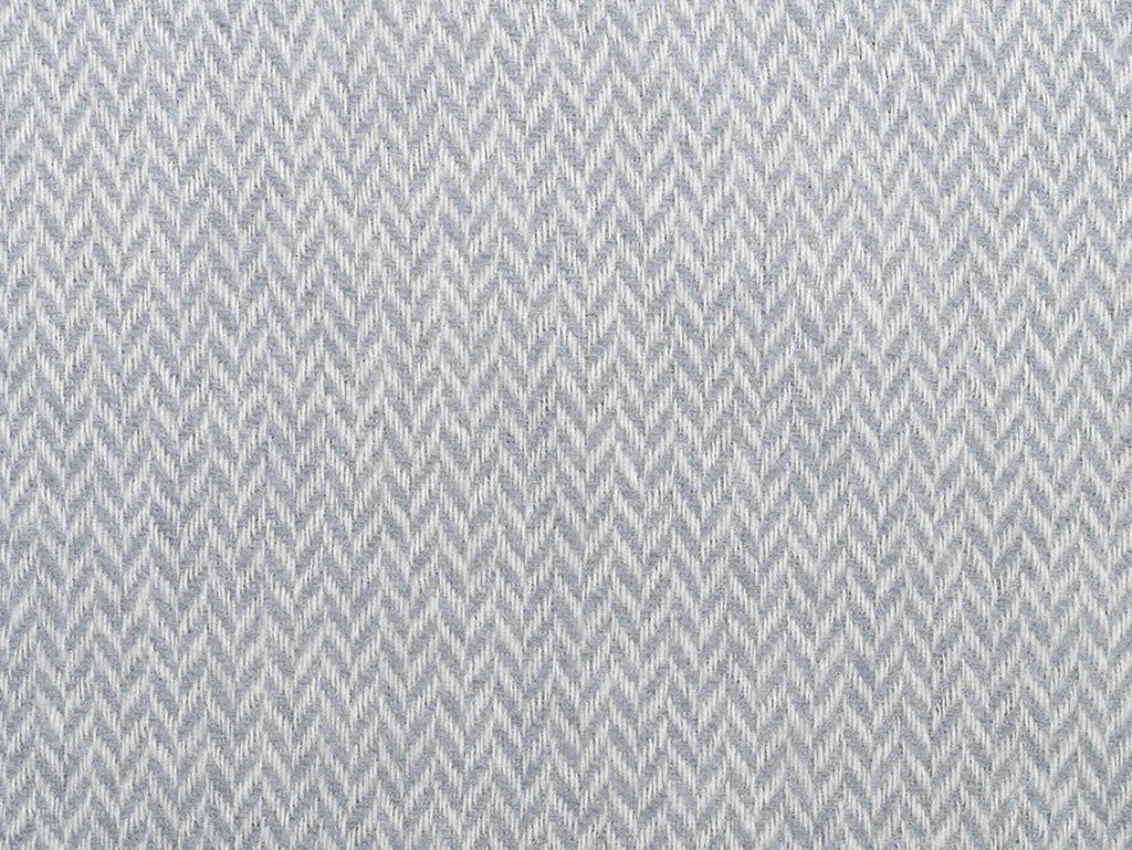 Close up view of the chevron pattern on the Ruanui Station 100% wool throw in Gulley Grey