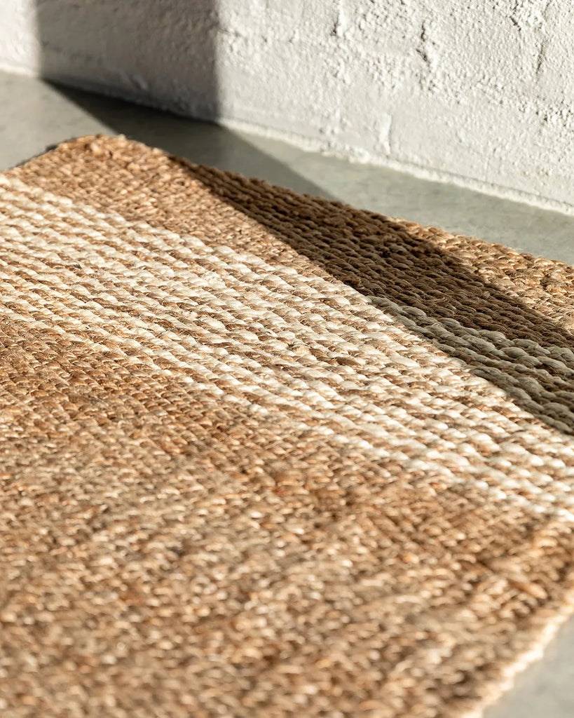 Close up of the Baya Anglesea entrance door mat in 100% Jute, shown at the entrance of a contemporary home