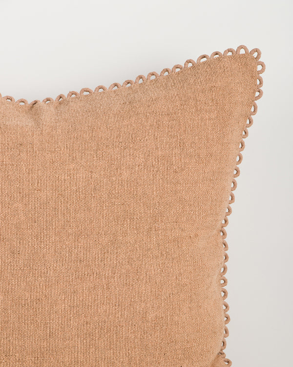 Baya Alden linen cotton blend cushion in Clay, close view of the loop-edge trim