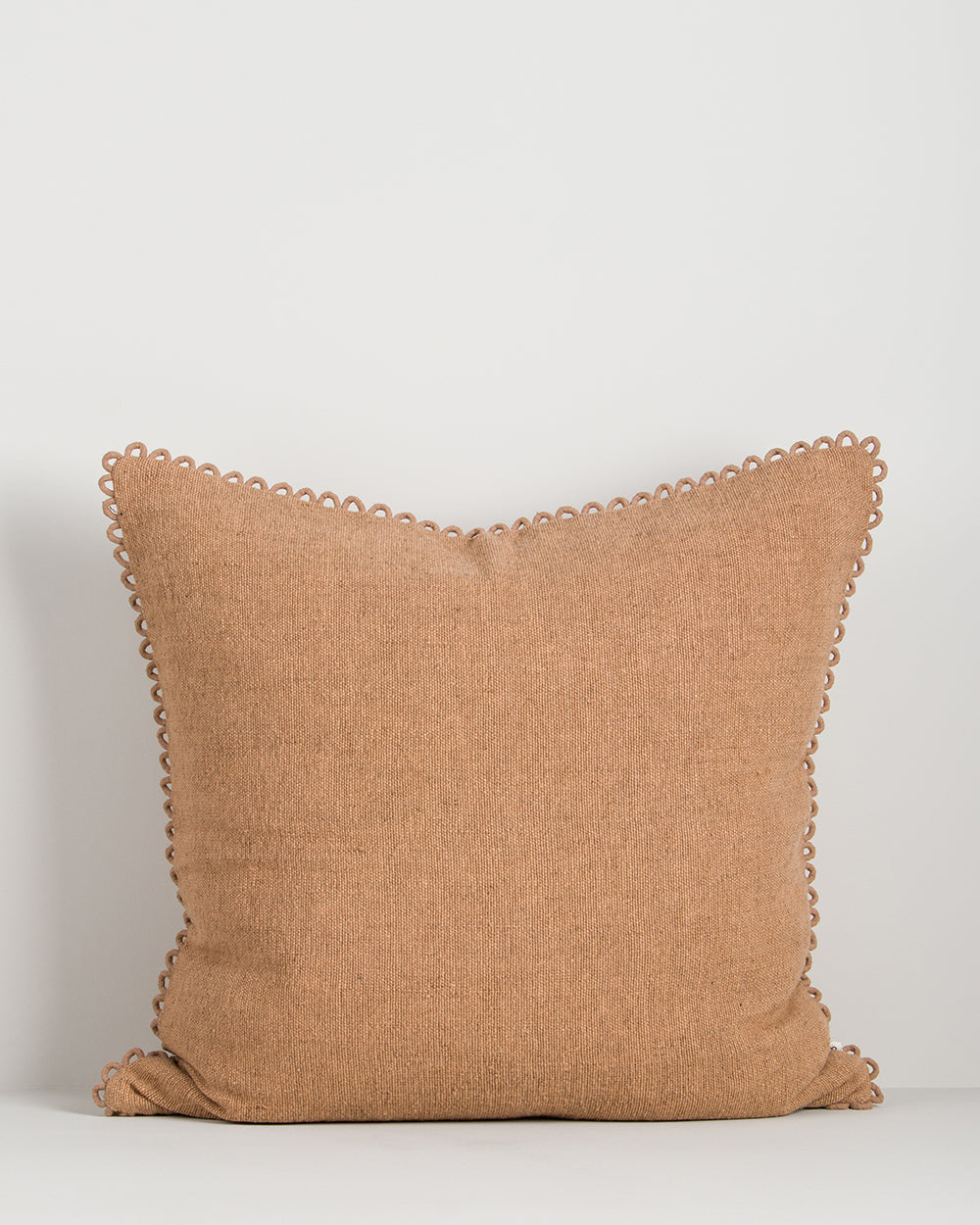 Baya Alden linen cotton blend cushion in Clay on a plain background