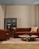 Baya Alden linen cotton blend cushion in Clay, styled on a rust velvet sofa