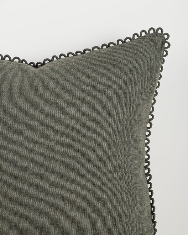 Baya Alden linen cotton blend cushion in Sage, close view of the loop-edge trim