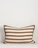 Baya Calden cotton lumbar cushion in Chestnut on a plain background