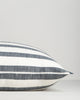 Baya Calden cotton lumbar cushion in Cloudburst, side view showing its shape and edge finish
