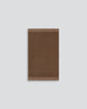 Baya Carla NZ wool floor mat in Cocoa, full flat view on a plain background.
