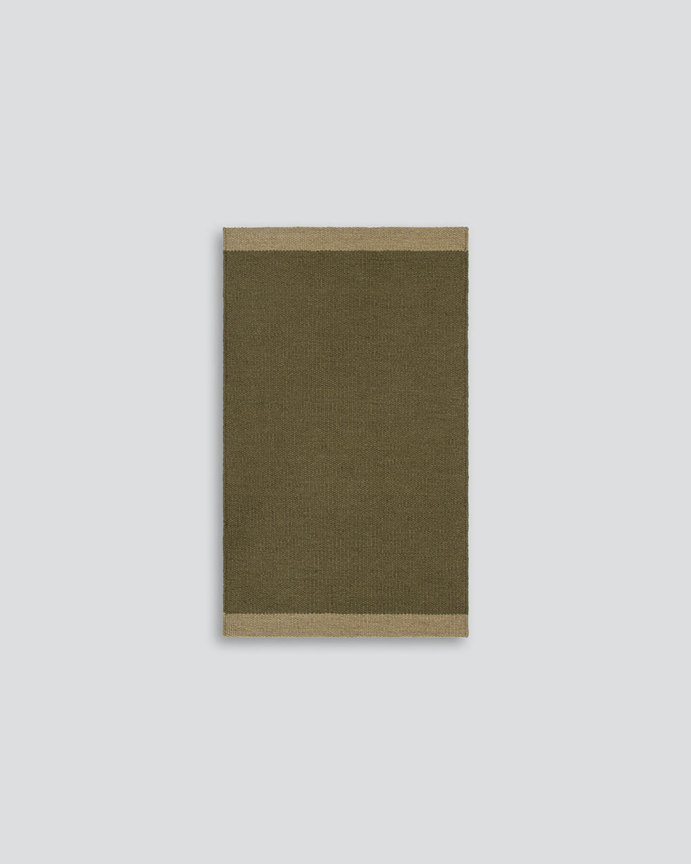 Baya Carla NZ wool floor mat in Military, full flat view on a plain background.