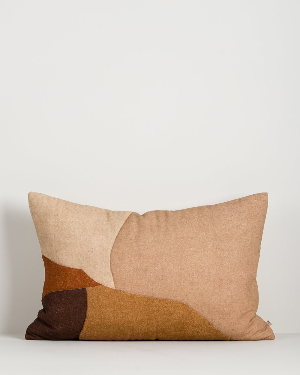 Baya Cortile lumbar cushion in Multi, front view showing the printed and quilted colour-block design on a plain background.