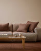 Baya Cyprian cushion in Espresso, side profile showing the filled shape.