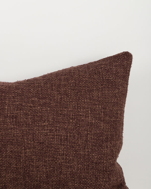 Baya Cyprian cotton blend lumbar cushion in Espresso on a plain background.