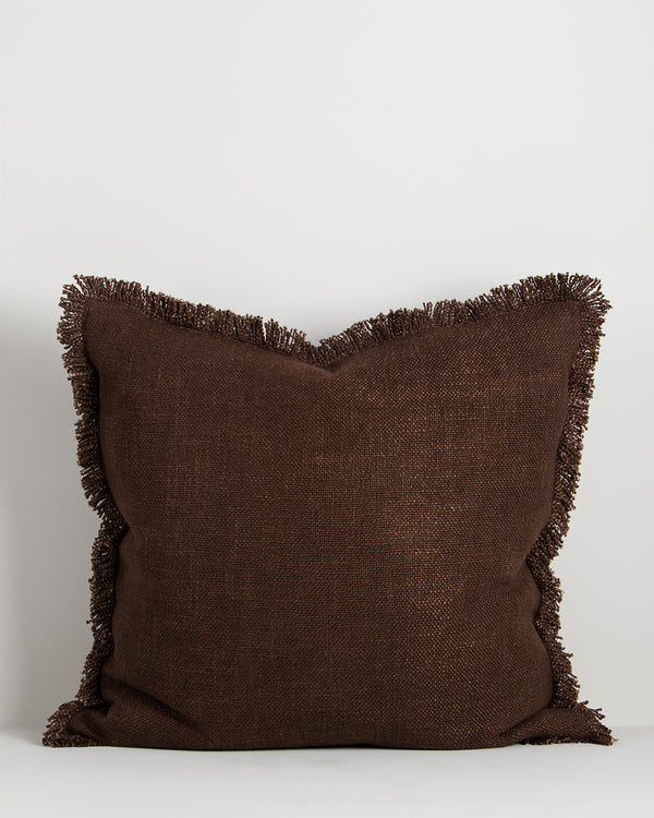 Baya Dover linen blend cushion in Chocolate, 55 x 55cm, front view on a plain background showing the fringed edge and textured weave