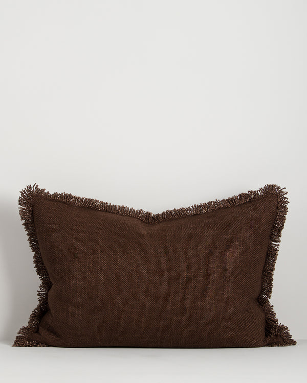 Baya Dover linen blend lumbar cushion in Chocolate, 40 x 60cm, front view on a plain background showing the fringed edge and textured weave