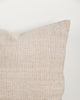 Close-up of the corner and weave texture on the Baya Dune outdoor cushion in Almond