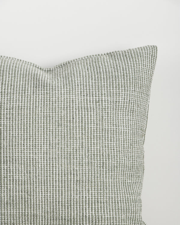 Close-up of the corner and weave texture on the Baya Dune outdoor cushion in Eucalyptus